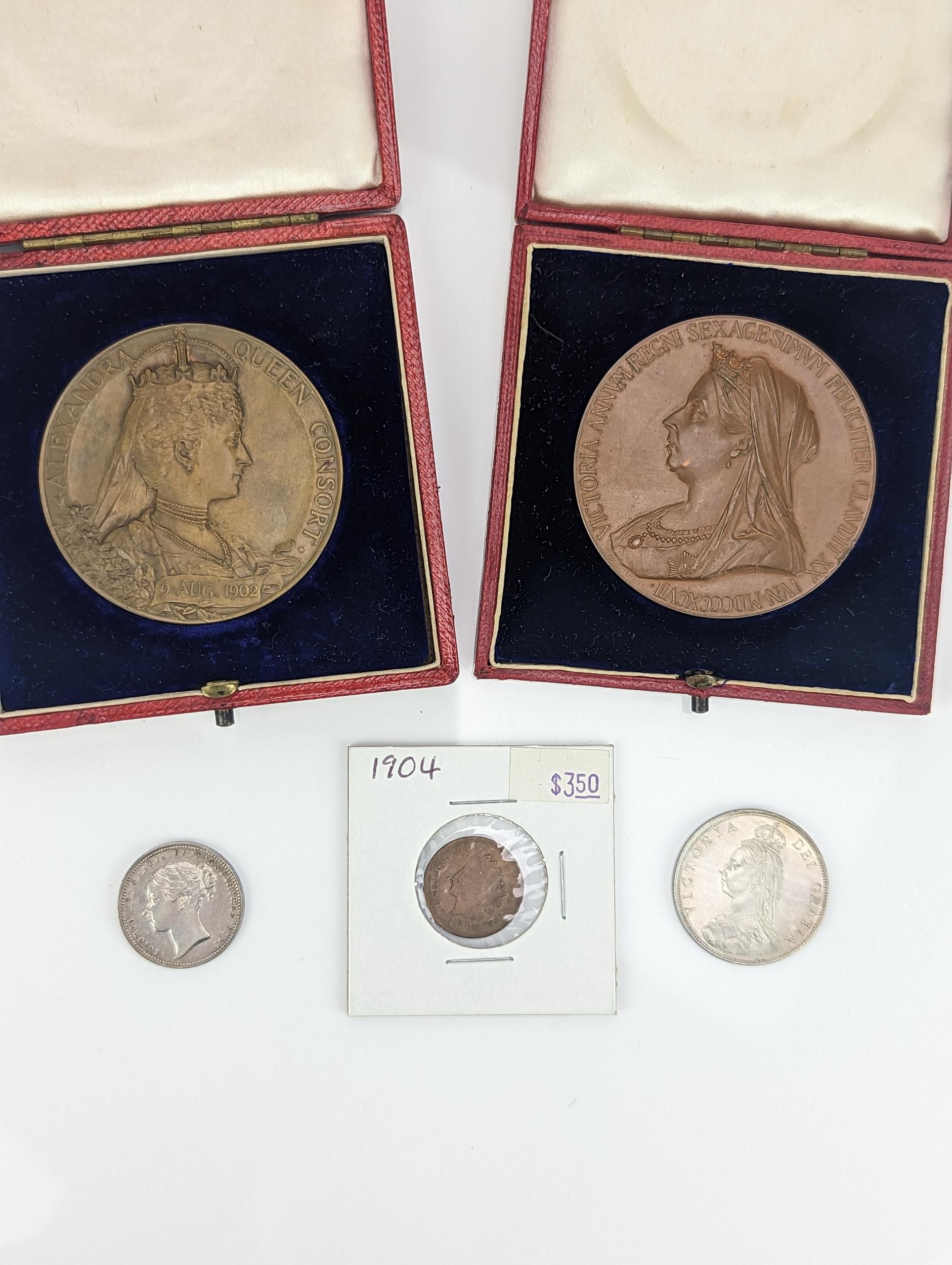 A collection of Victorian and later coins to include a 1887 Florin, 1868 Shilling, along with a