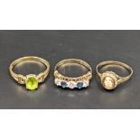 Three rings, two 9ct gold set with a cameo and with clear and blue stones, and another stamped