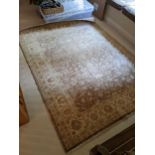 A Zegla style rug with pelmets and vines on a brown ground, 250cm x 85cm Location: G