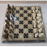 An Egyptian chess board parquetry inlaid with mother of pearl and bone Location: