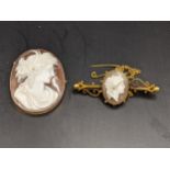 Two 9ct gold cameo brooches to include a stick pin brooch with beaded decoration, 10.7g Location:
