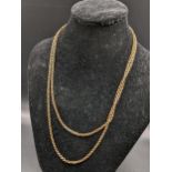 A yellow metal muff/guard chain with gold plated clasp, 17g Location: