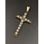 A 9ct gold cross shaped pendant inset with paste stones, 6.6g Location: