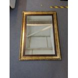 A contemporary wall mirror with gold painted frame, 110cm x 95.5cm Location: