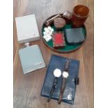 A mixed lot to include leather games set of dice, shaker and other related items together with a