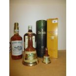 One bottle of Southern Comfort, two Bells flasks, one bottle of Ballantines finest scotch whisky