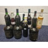 Eleven mixed bottles to include Blandy's Madeira, Captain Morgan Rum, Grenache noir Location: