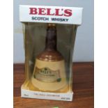 A single bottle of Bell's scotch whisky in a stoneware flask, 75cl