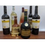 Seven mixed bottles to include Bells Scotch whisky, Sancerre, and French Brandy