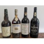 Four bottles to include Graham's Malvedos 1978. Dow 1978, Setubal and Solera 1914 A/F