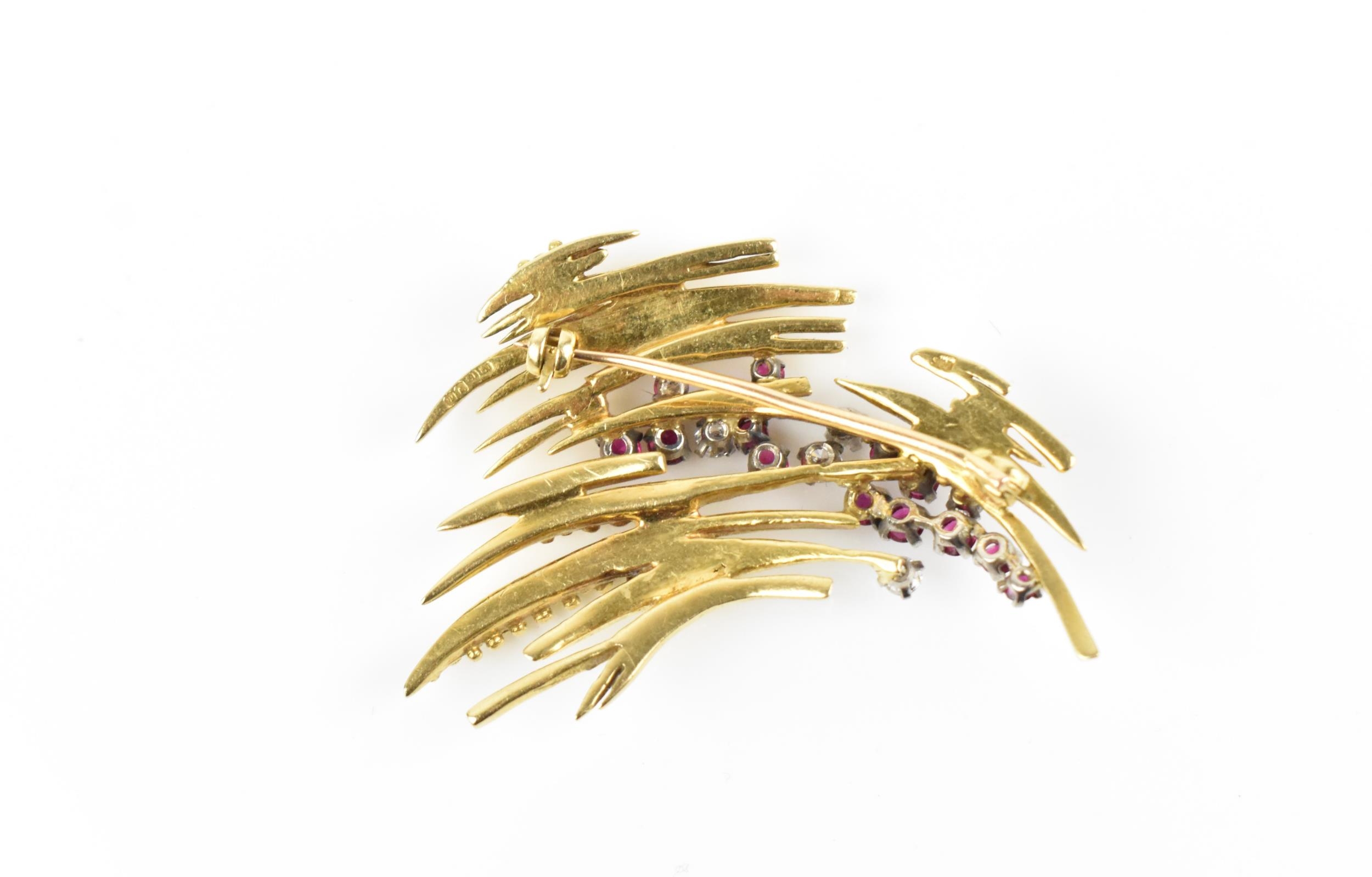 An 18ct yellow gold, diamond and ruby brooch, in the Modernist taste, set with five brilliant cut - Image 3 of 5