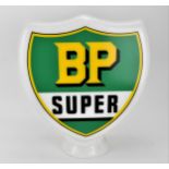 A 'BP Super' shield-shaped glass petrol pump, with design and lettering in yellow, green and