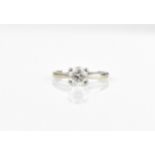 An 18ct white gold solitaire diamond ring, the brilliant cut diamond approx 0.5ct, size K 1/2,