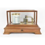 An early 20th century mahogany cased barograph by B. Barnett, with five glazed sides and front