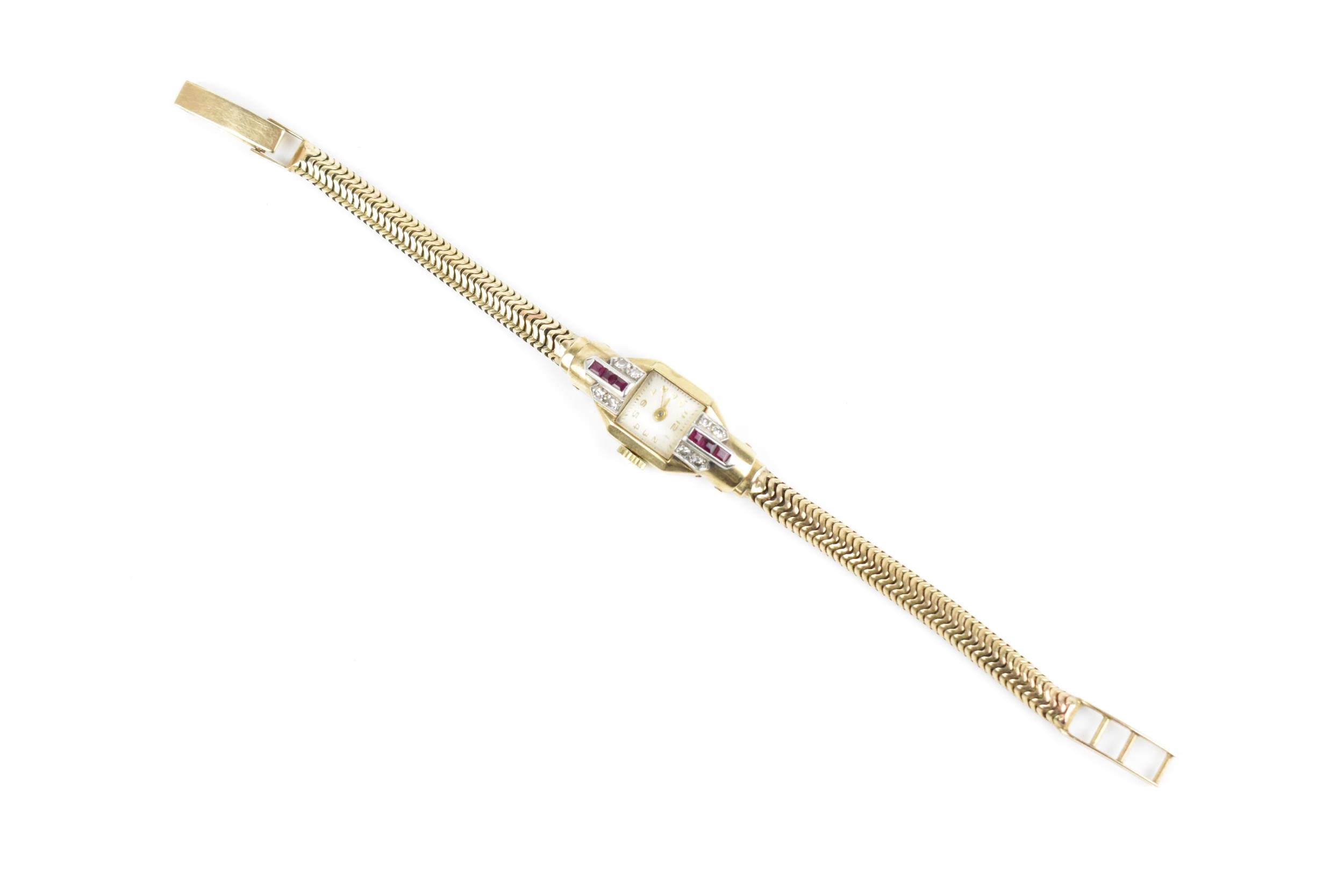 A 9ct yellow gold, diamond and ruby ladies wristwatch, the square dial with curved glass and Arab