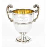 An Edwardian Continental silver horse racing trophy cup, stamped 'Silver', the front inscribed '