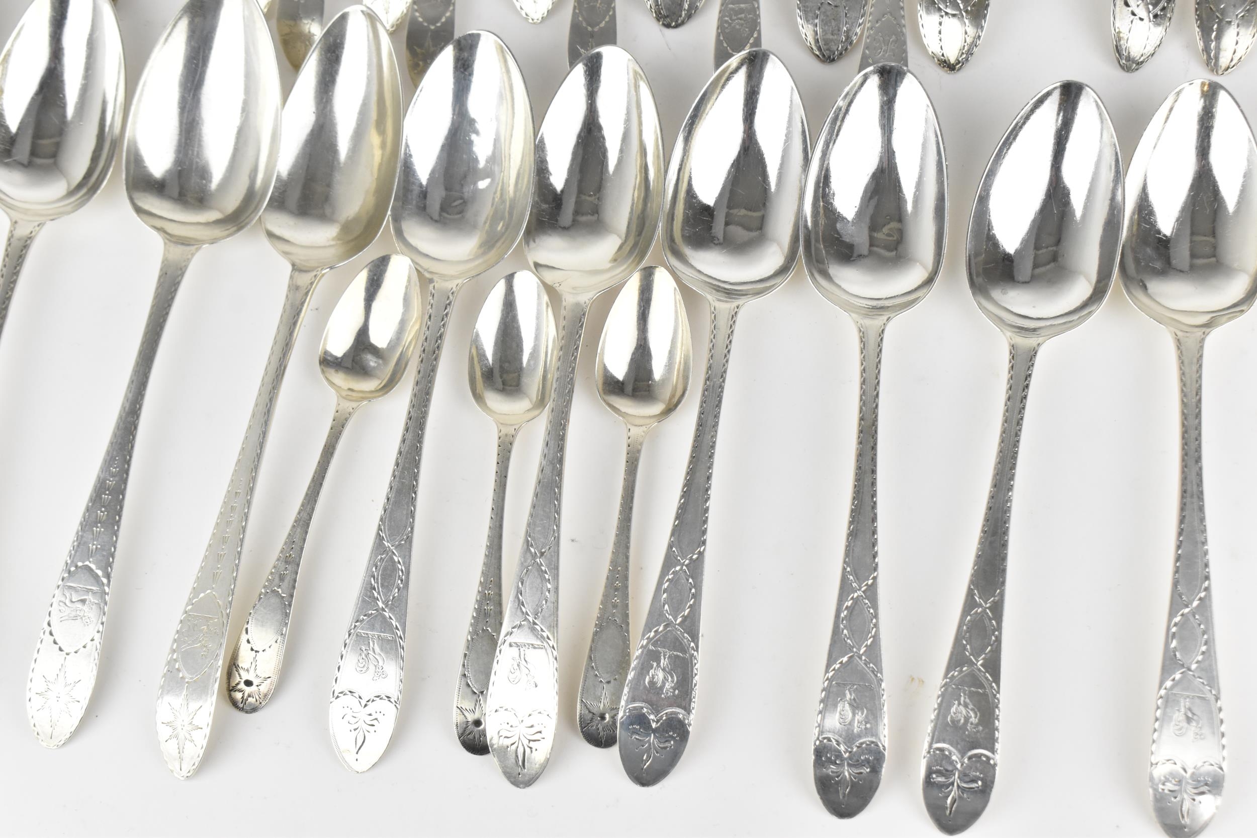 A collection of George III Irish silver tablespoons, comprising different dates and silversmiths, to - Image 2 of 11