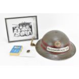 A Second World War era BroomWade Fire Brigade Steel Helmet, together with a Broomwade Club badge,