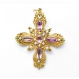 A Georgian pink topaz, pearl and emerald cannetille cross pendant, circa 1820s, with intricate