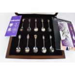 A cased Set of Elizabeth II silver gilt 'Queen's Beast' Spoons by Toye, Kenning & Spencer,