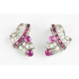 A pair of Art Deco ruby and diamond clip on earrings, with graduated trail of old European cut