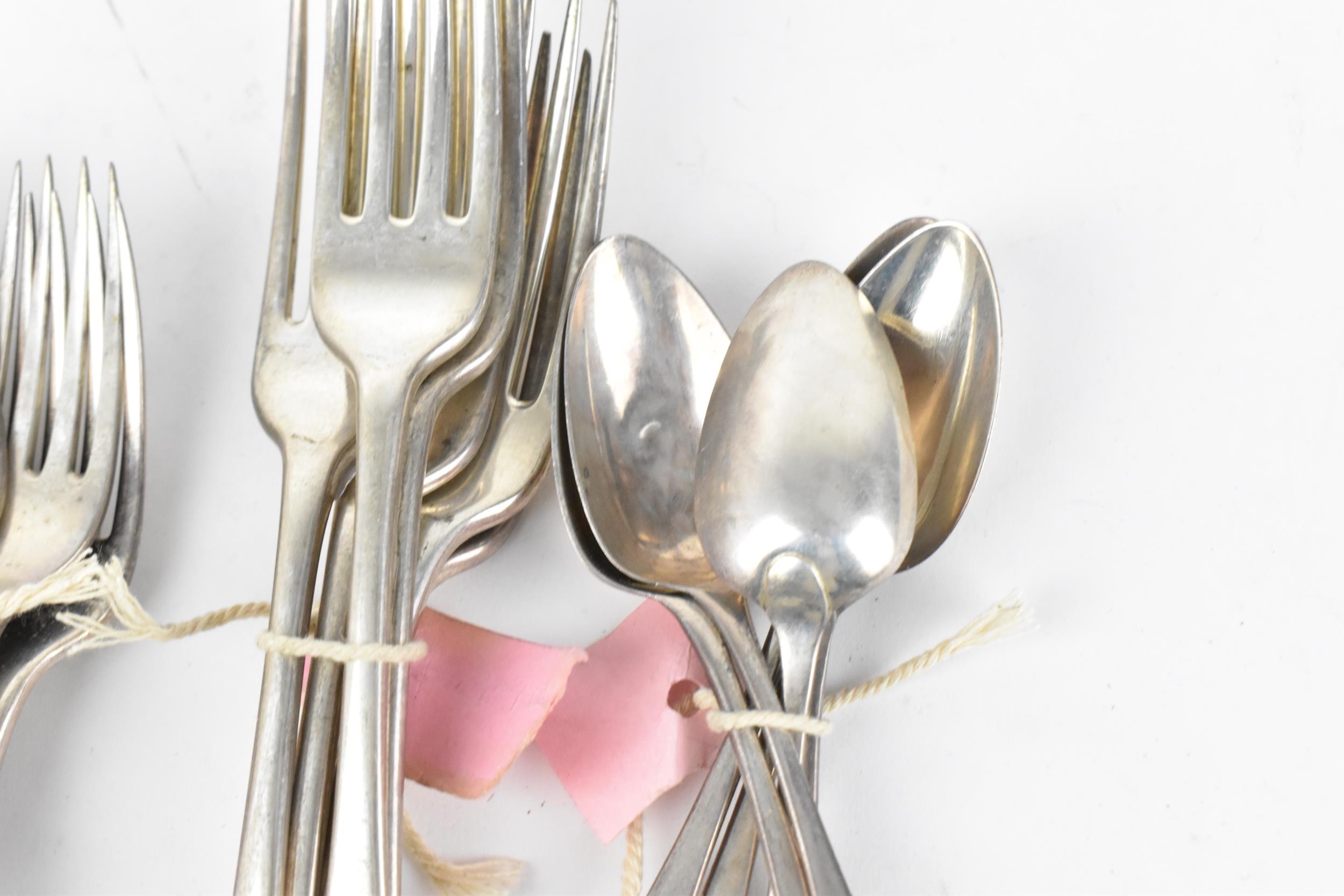 A small collection of mixed George III silver flatware, comprising six tableforks by Richard - Image 3 of 7