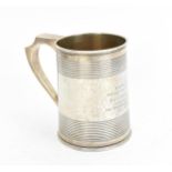 A George III silver pint mug, London 1809, of tapered circular form with barrel-style reeded bands