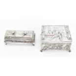 A late Victorian silver jewellery casket, circa 1900, designed with heavily embossed figural