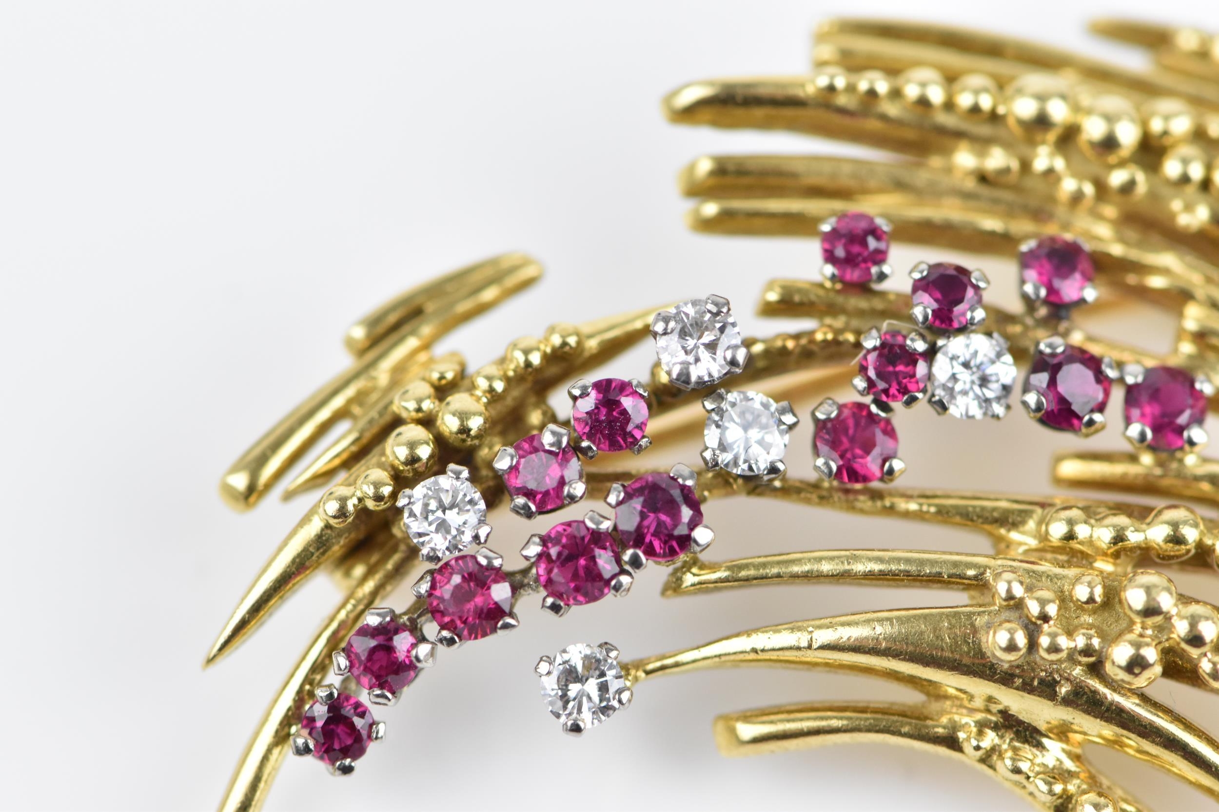 An 18ct yellow gold, diamond and ruby brooch, in the Modernist taste, set with five brilliant cut - Image 4 of 5