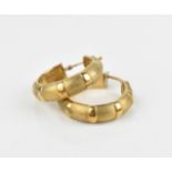 A pair of Italian 9ct yellow gold hoop earrings, with textured detail, stamped 375 'Italy', weight