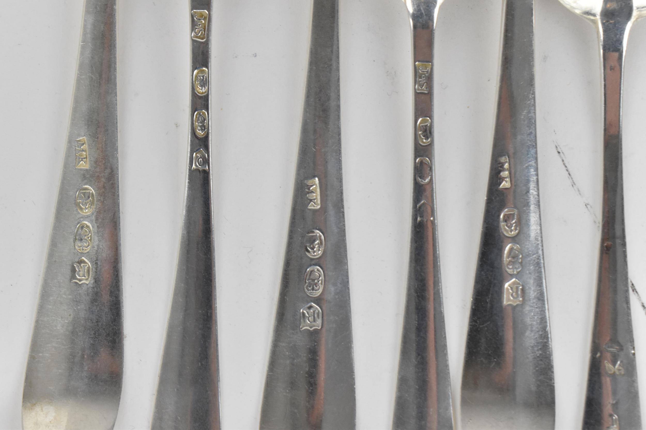 A collection of George III Irish silver tablespoons, comprising different dates and silversmiths, to - Image 7 of 11