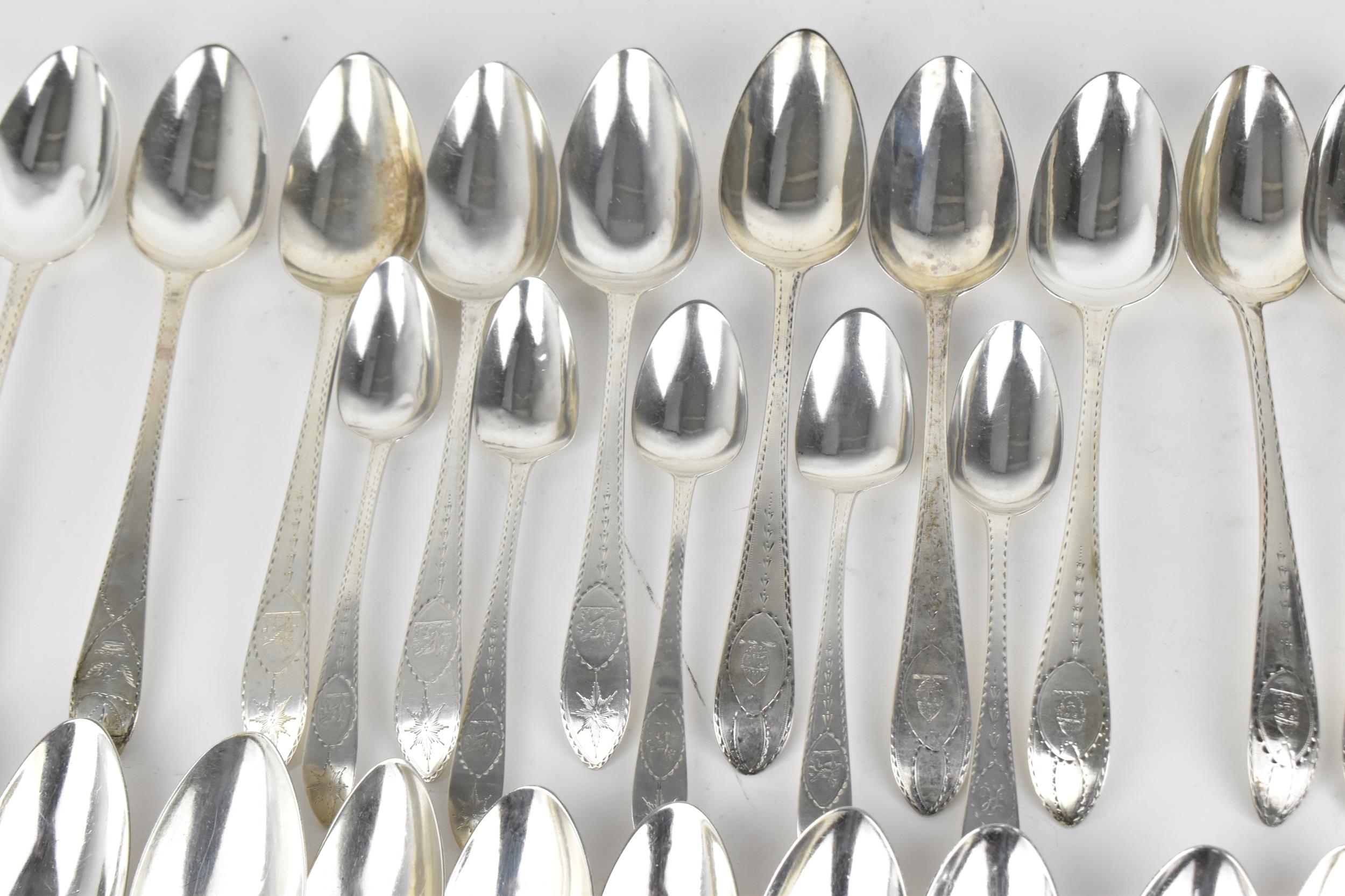 A collection of George III Irish silver tablespoons, comprising different dates and silversmiths, to - Image 3 of 11