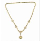 An Edwardian yellow metal, diamond and pearl necklace, designed with pearl-mounted links, the