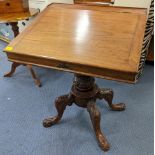 A 19th century mahogany walnut and elm desk on a turned column and splayed legs Location: