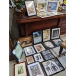 A selection of framed and glazed reproduction train and travel posters, photographs, and New