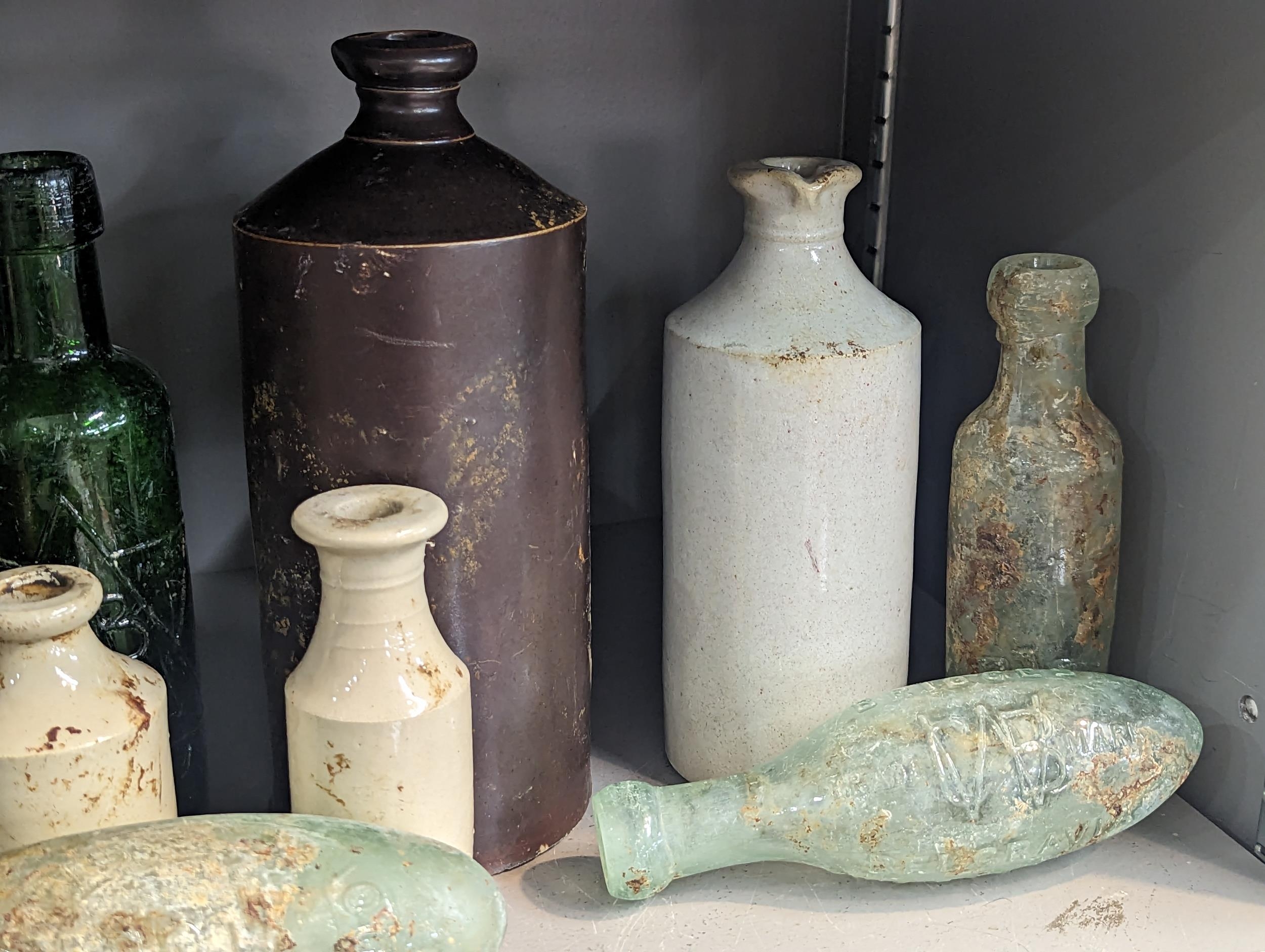 A group of mixed 18th/19th century glass and stoneware bottles and flasks A/F, to include - Image 6 of 7