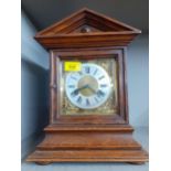 A Junghans mantel clock with key Location: