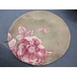 A contemporary Sanderson circular rug decorated with a butterfly and flowers, 151cm d Location: