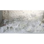 A mixed lot of glassware to include a green glass apothecary bottle, decorative glass bowls, a sugar
