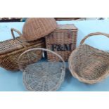 A quantity of wicker baskets to include a Fortnum & Masons basket, a cloche and a picnic hamper
