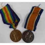 A pair of WWI medals, British War and Victory medals stamped SE-25112 PTE E Patient AVC Location: