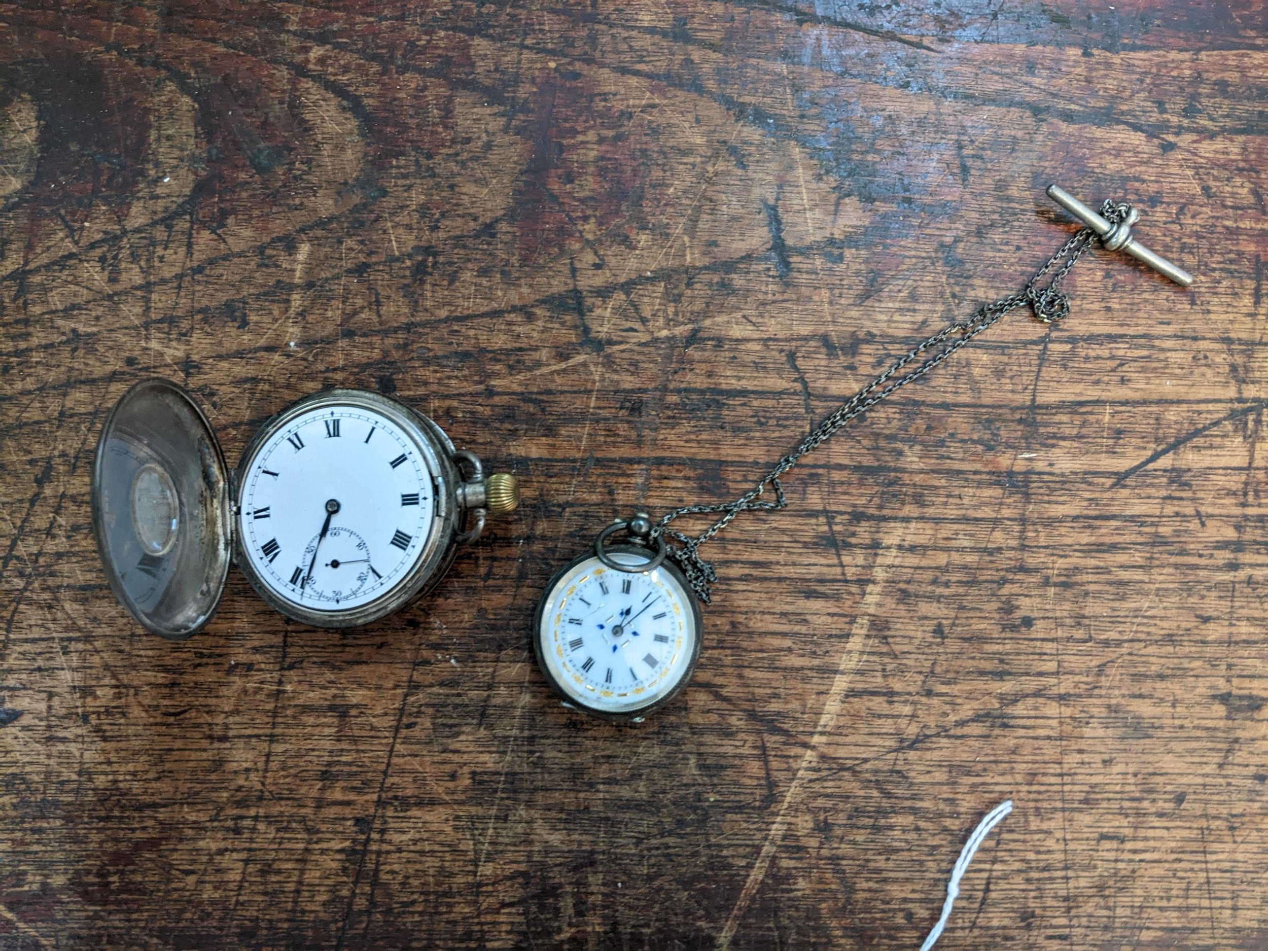 An early 20th century manual-wind half-hunter pocket watch, in silver Dennison case, with blue