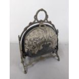 A Victorian silver plated biscuit warmer of shell design having embossed floral design Location: