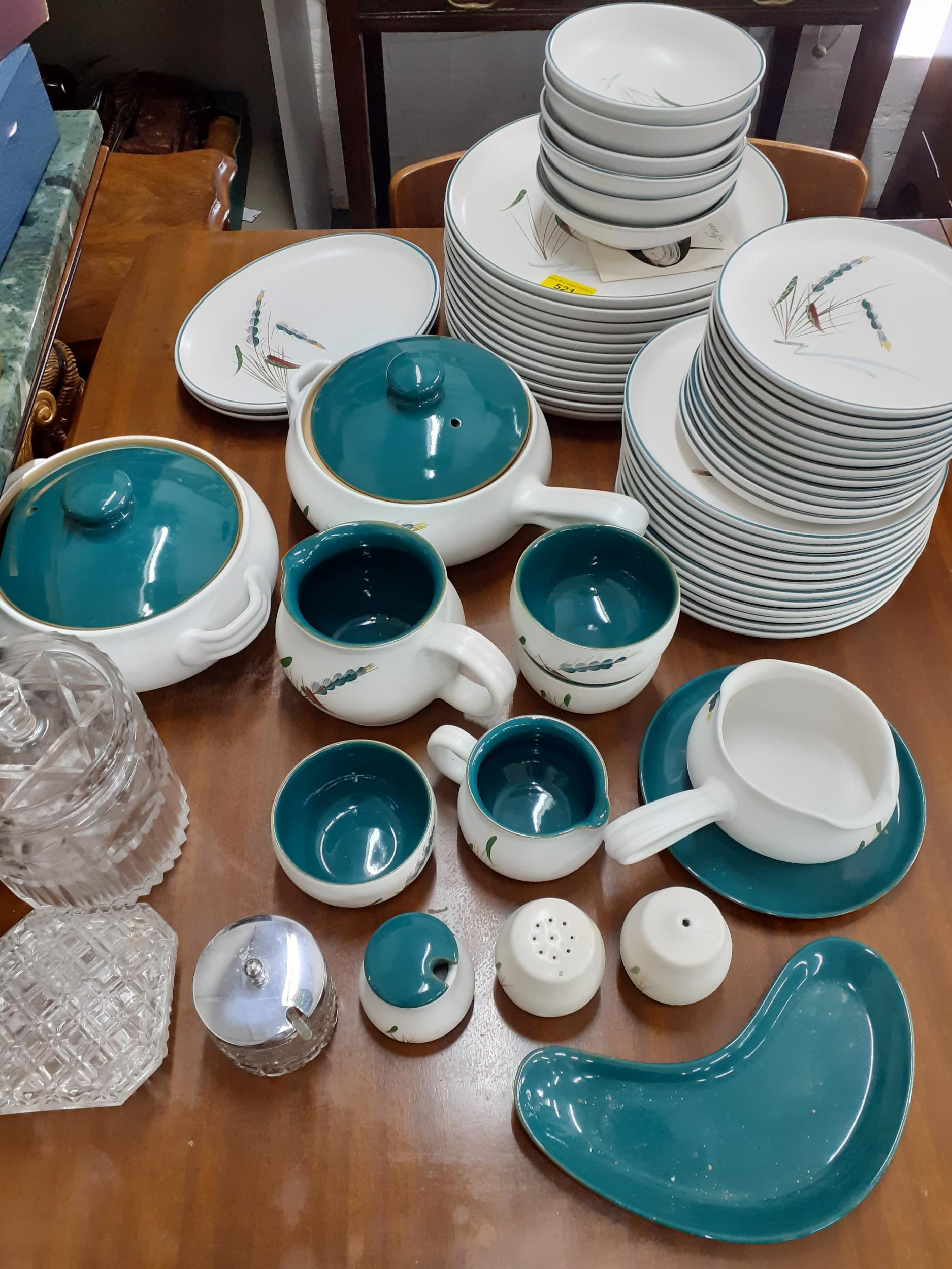 A Denby Green Wheat ovenproof dinner service to include 12 dinner plates and 2 tureens, together