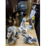 A group of Lladro porcelain figurines to include Don Quixote A/F, and two children sheltering