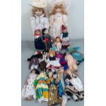 A quantity of worldwide dolls together with an American flyer's helmet bag DLA100-85-C-4545 and
