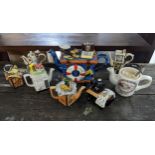 A group of small Cardew Designs novelty teapots to include a sewing machine teapot, along with a
