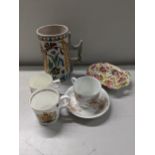 Ceramics to include a Isnick vase commemorative mugs, a cup and saucer and a Winton Chinty dish