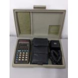 Two vintage boxed calculators, HP-35 and HP-65 with accessories