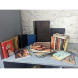 A mixed collection of books and magazines to include Tom Jones, The Thousand and One Nights,